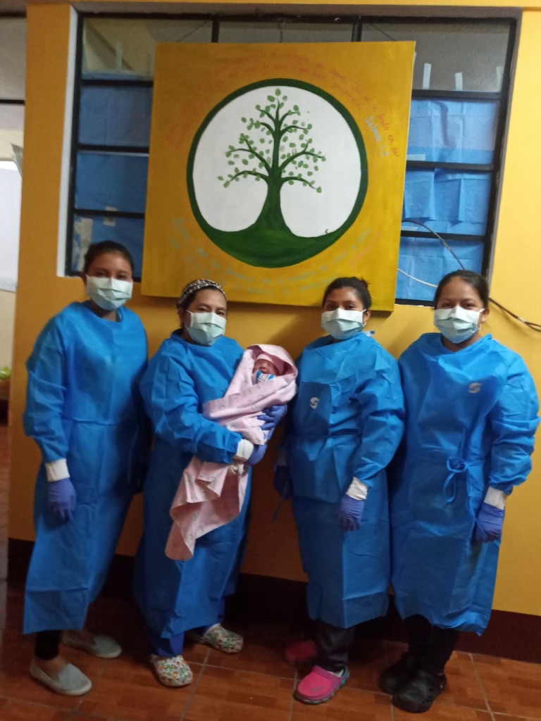 Casa Materna Midwives and Nurses with a newborn