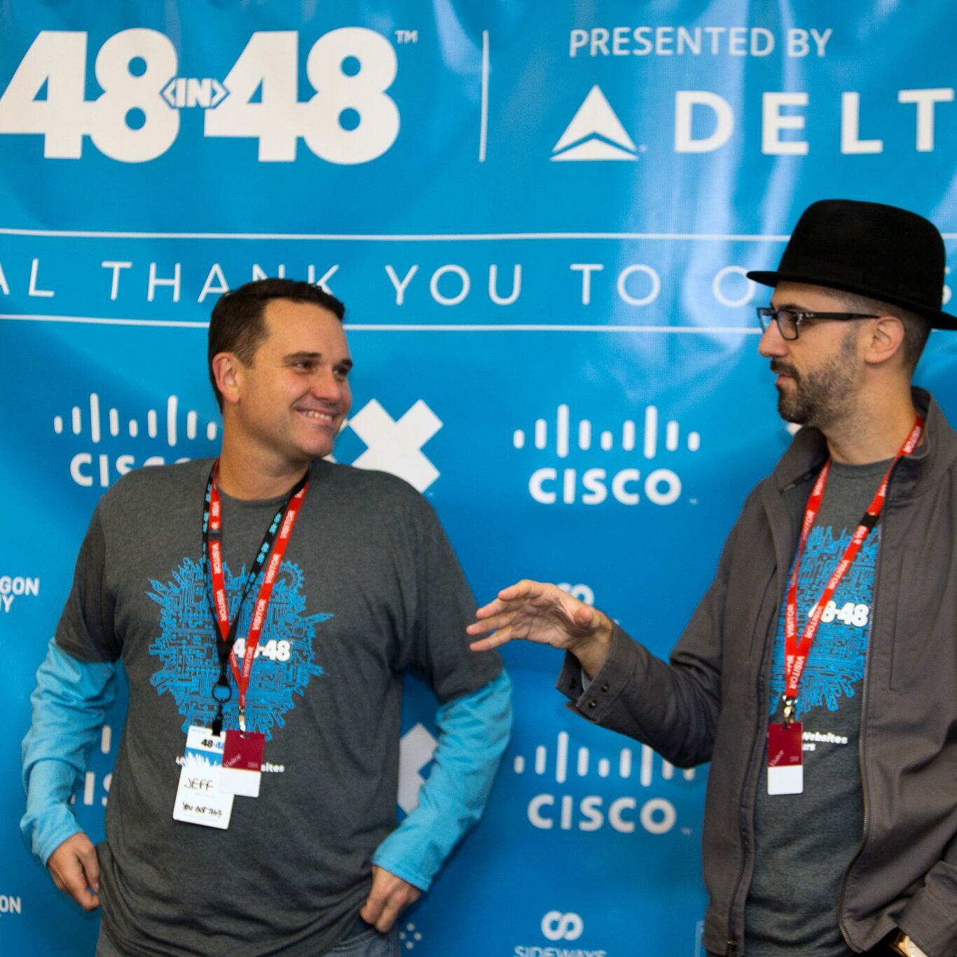LONDON, UNITED KINGDOM - NOVEMBER 4:  Jeff Hilimire (L) and Adam Walker (R), speaking during the 48in48 event, sponsored by Delta, in London, UK, on November 4, 2018. 48in48 is an event which seeks to help 48 non-profit companies better serve their communities with 48 websites, all in 48 hours, and all with the help of volunteers.